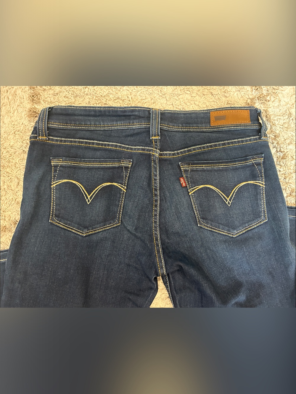 Dark Wash Levi’s Jeans with Yellow Stitching